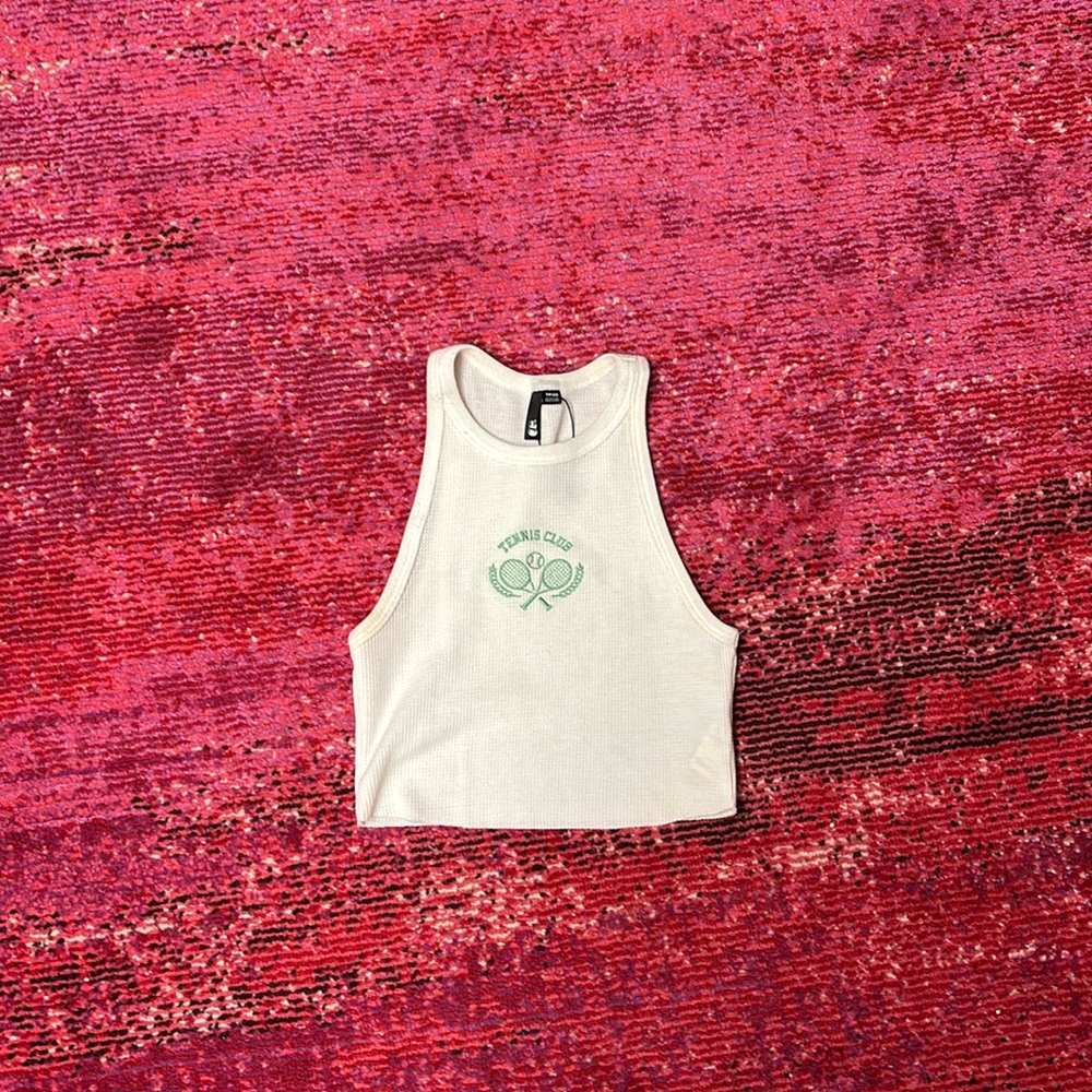 Garage tennis club tank